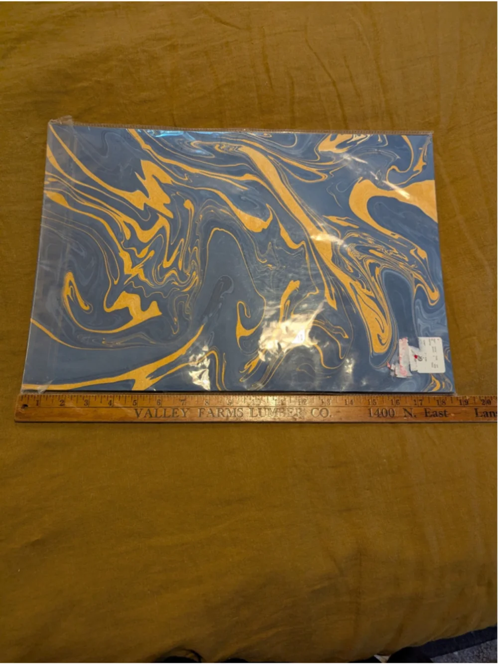 Hester and cook marbled collection paper placemats Blue and gold vein
